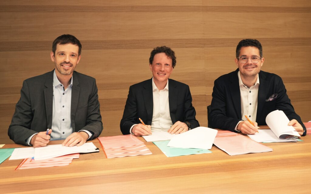 Climeworks' Co-CEOs Jan Wurbacher & Christoph Gebald, and CFO Andreas Aepli sign financing round.