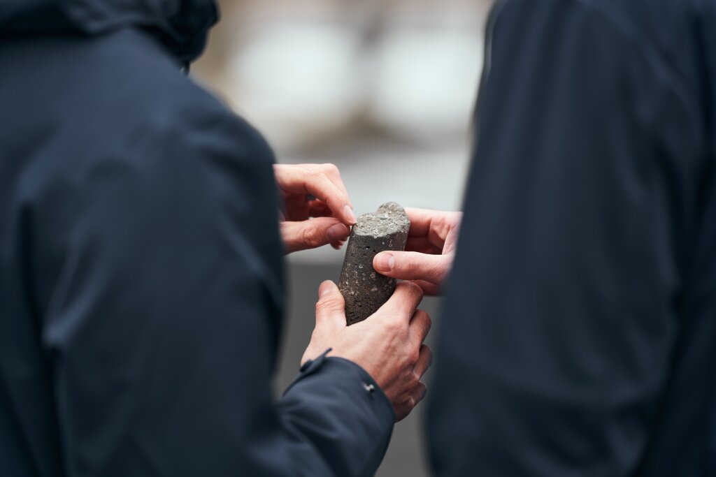 Jan and Christoph holding a stone